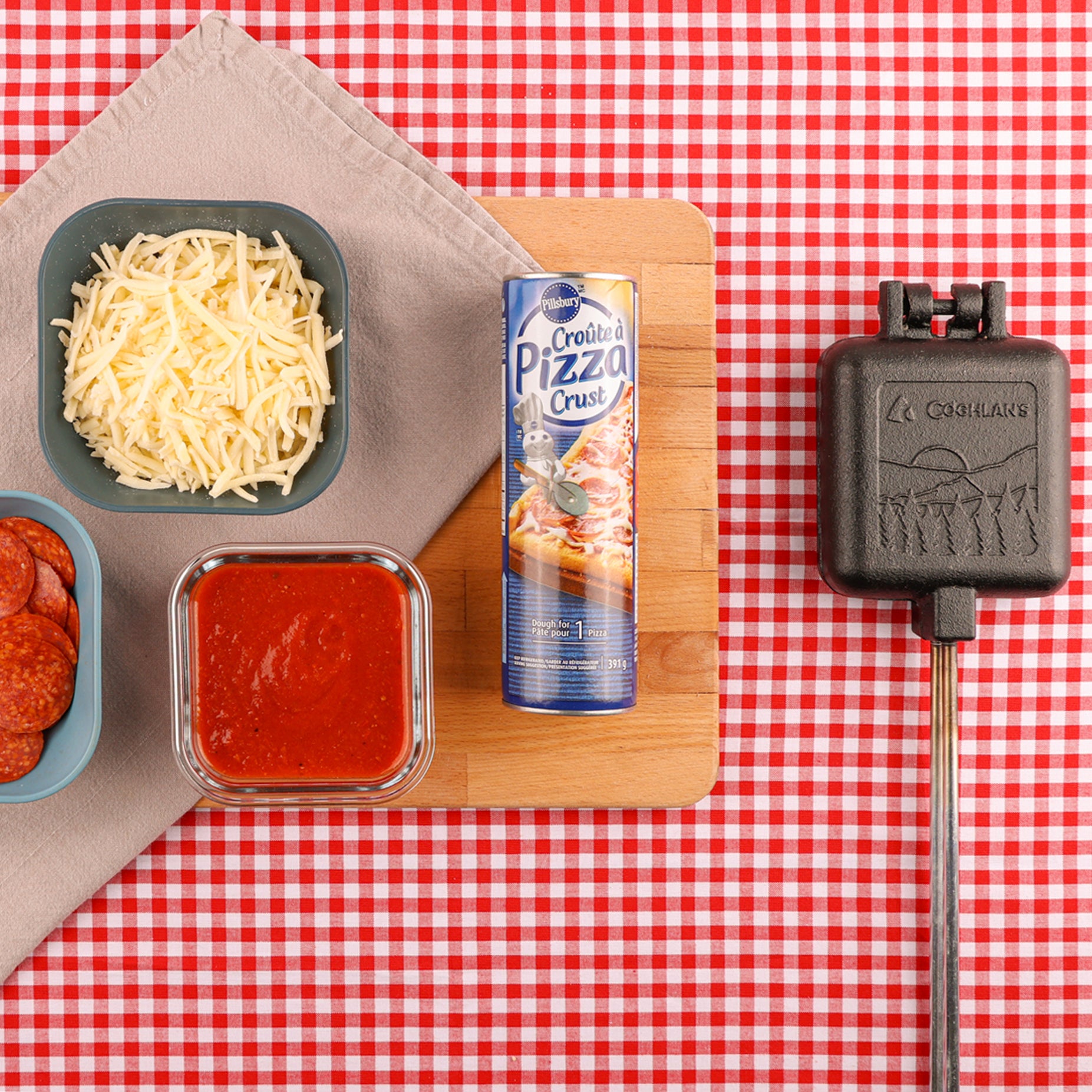 igredient for pizza on picnic table
